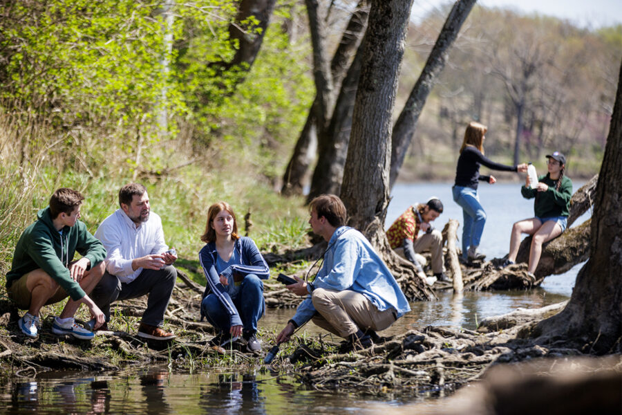 Group of students conducting outdoor experiment