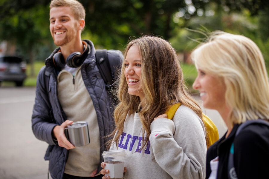 Image of three smiling students