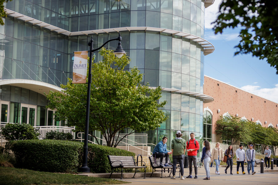 Students walking in front of Perry Center.