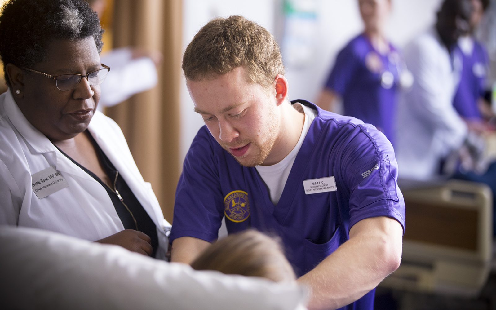 Olivet_Nursing_College of Distinction_recognition_professor_teaching_student_Web.jpg