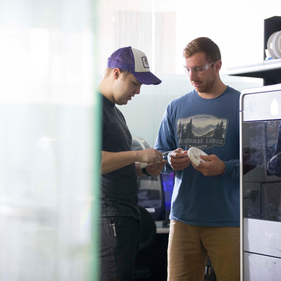 Two students in engineering lab