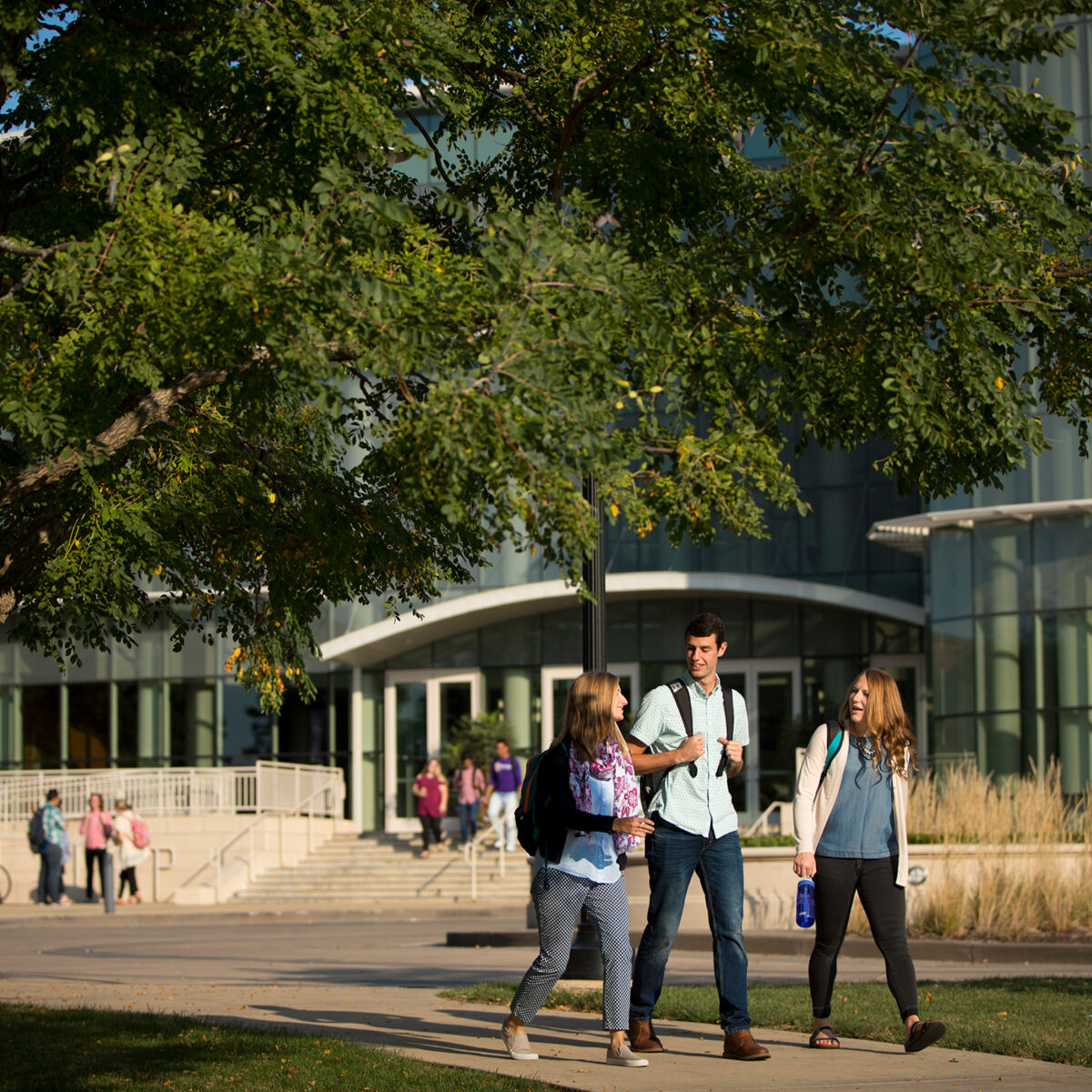 Students walking in front of Perry Center