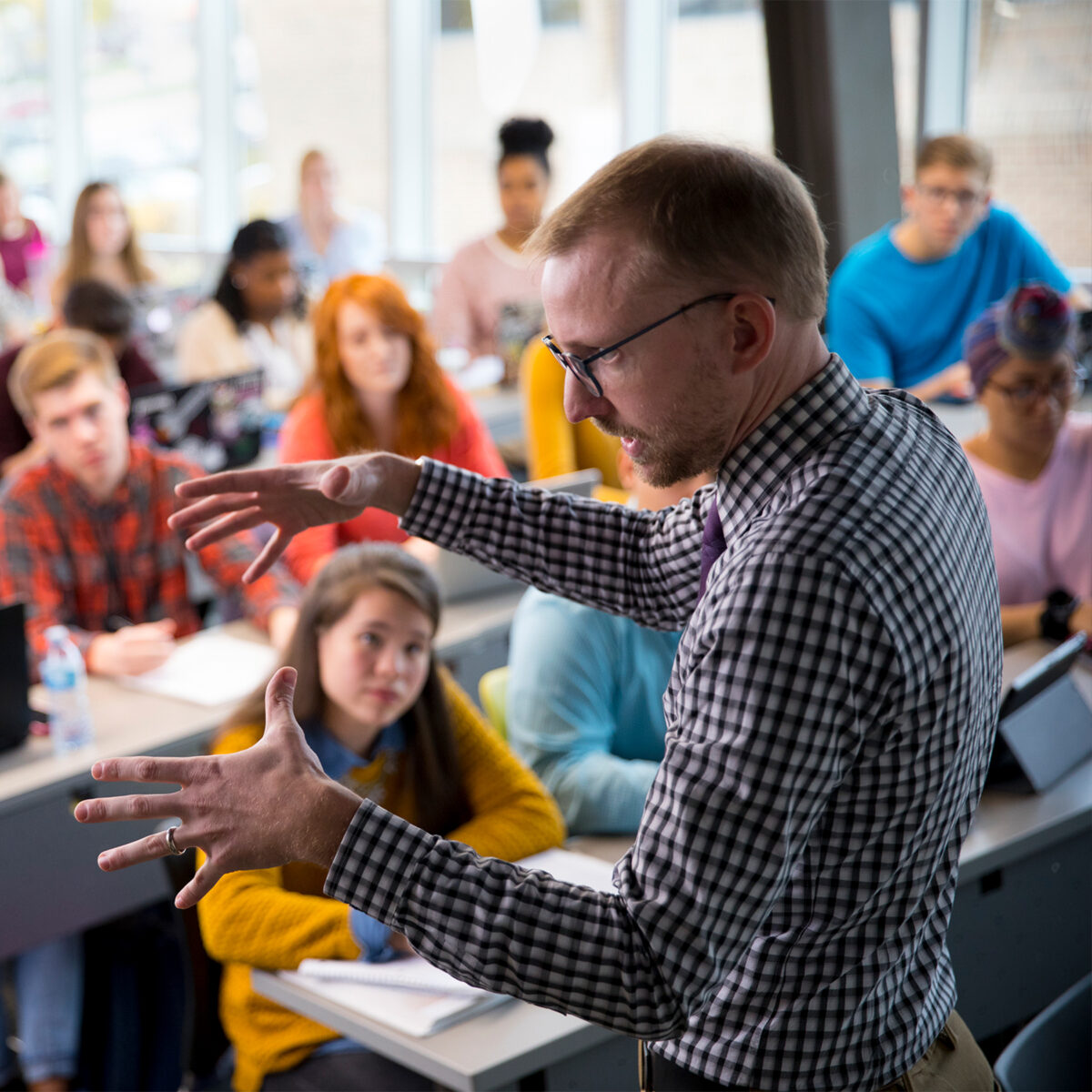 Professor teaching to a full class