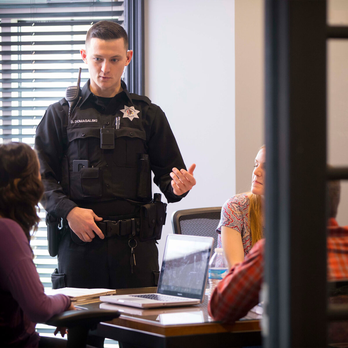 Police officer as a guest speaker in a class