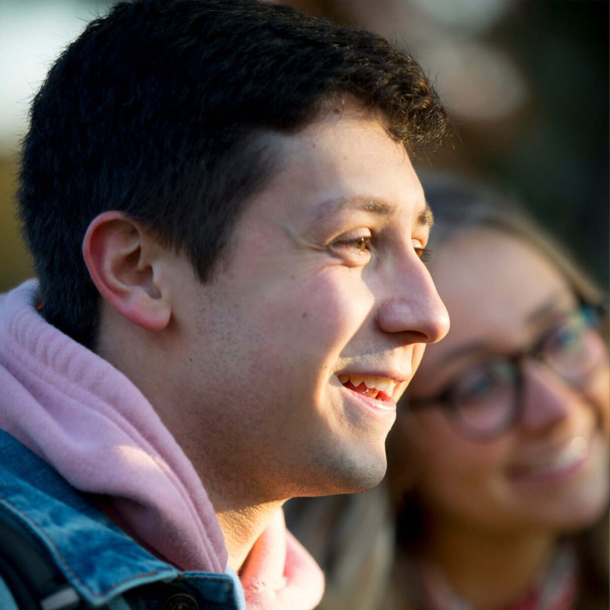 close up picture of man smiling outside