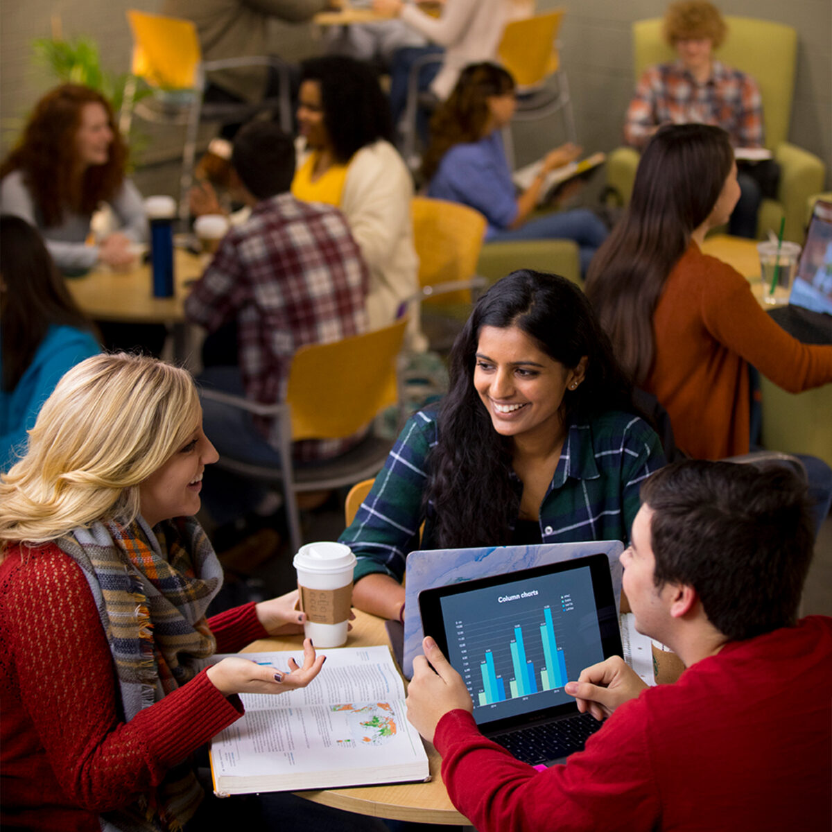 Group of three students working on a group project