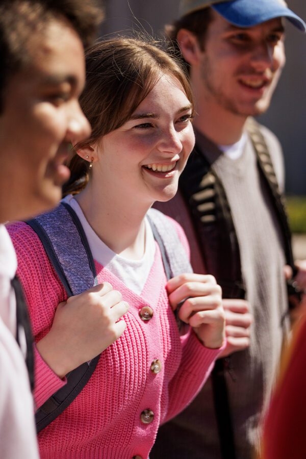 Female student smiling in the Quad