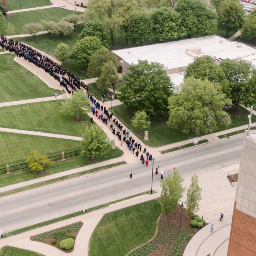 Aerial view of graduates entering Centennial Chapel