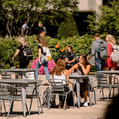 students walking on Olivet's campus