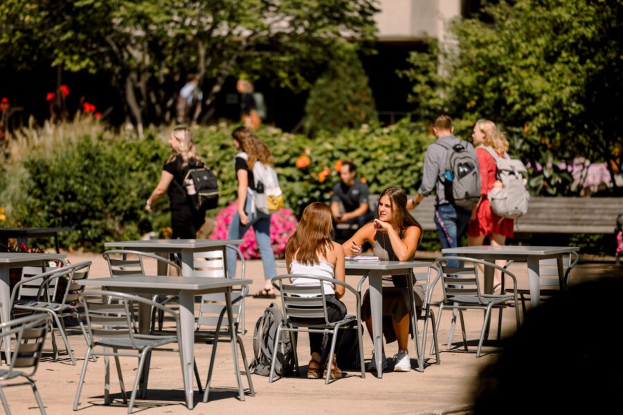 students walking on Olivet's campus