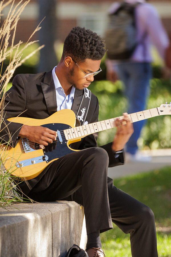 Photo of male guitarist