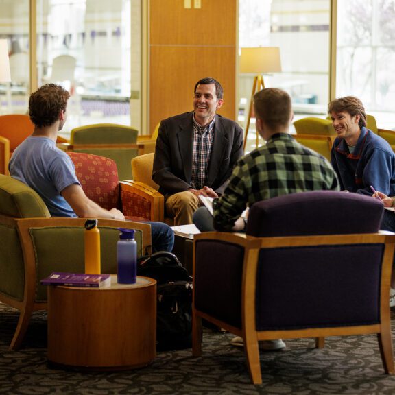 professor and students in lobby
