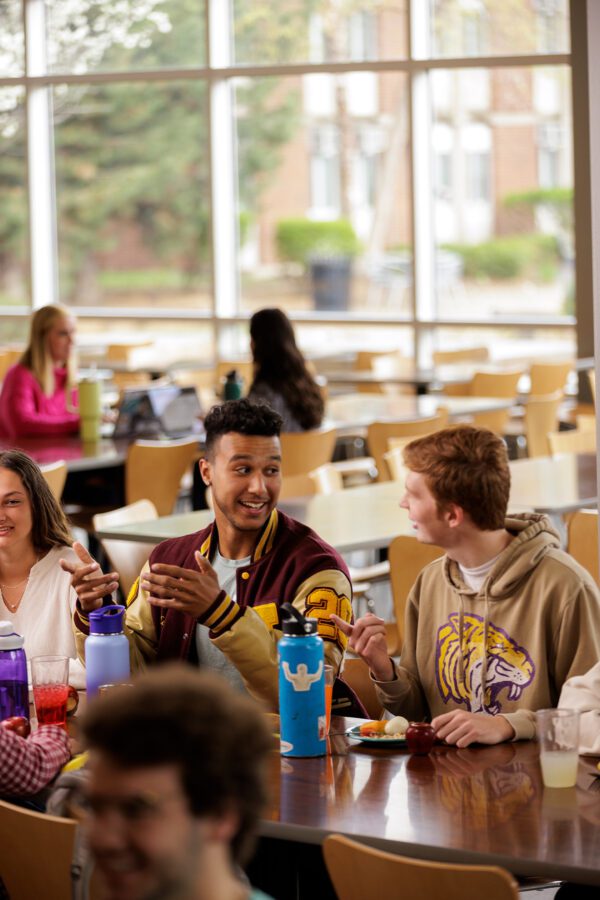 students having breakfast in cafeteria