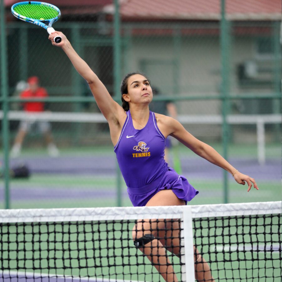Women's tennis player in action