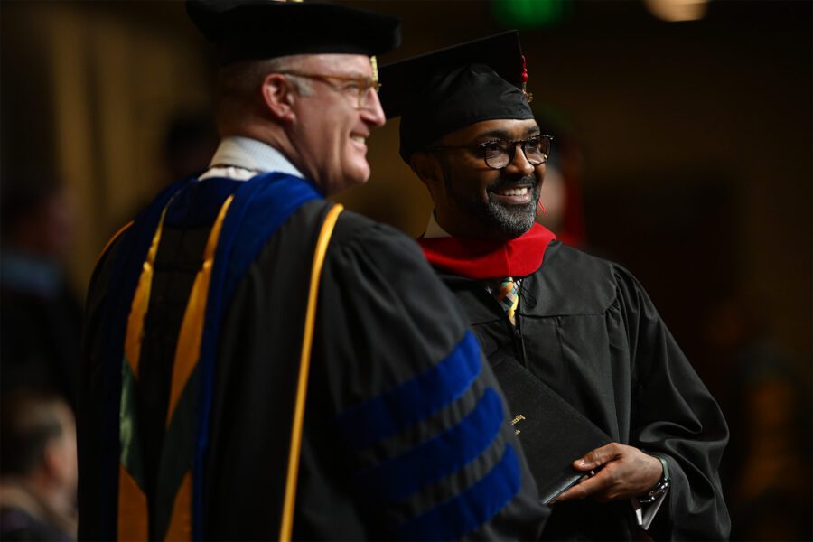 male graduate student with president chenoweth