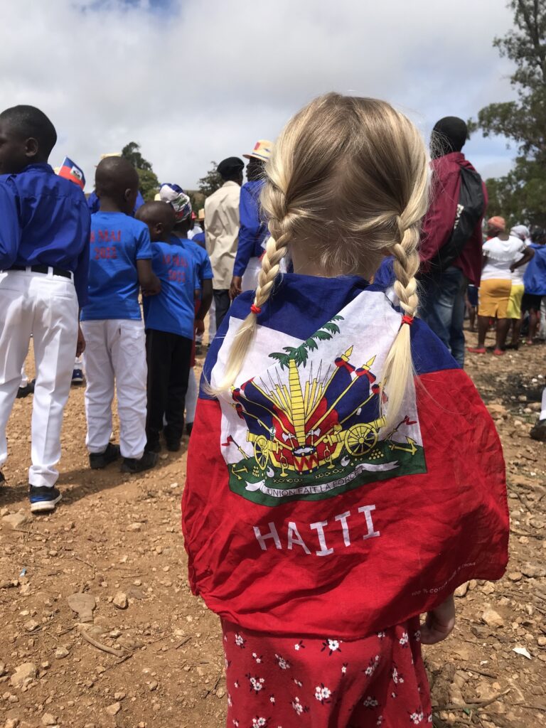 girl wearing Haiti flag