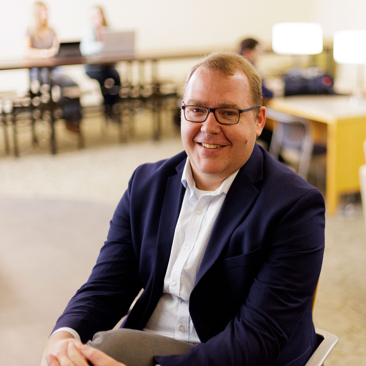 Lance Kilpatrick sitting at desk