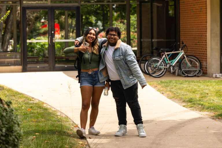 two students posing for camera