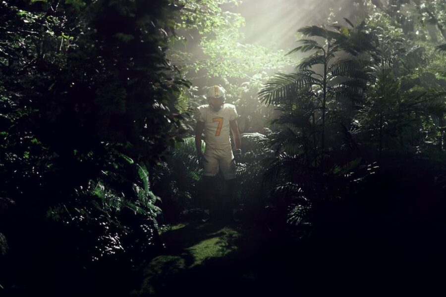 football player in jungle