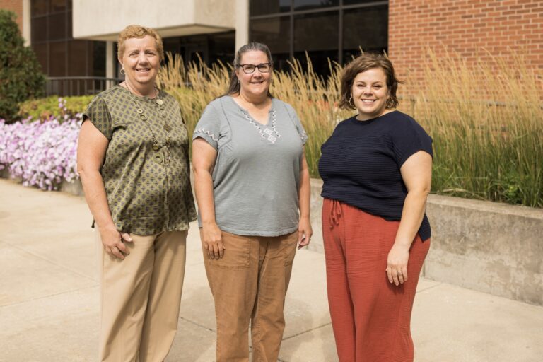 Accessibility And Disability Resources staff standing outside