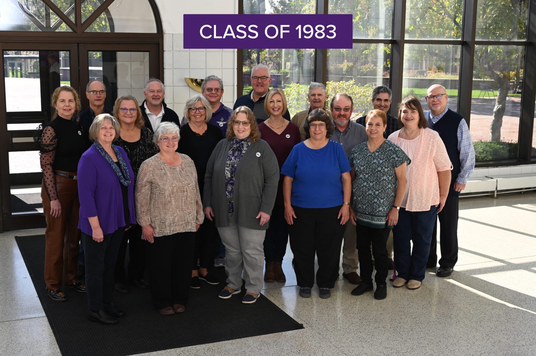 Those who came for the class reunion of 1983 pose for a group photo