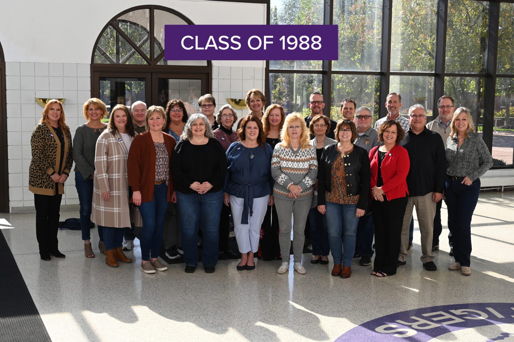 Those who came for the class reunion of 1988 pose for a group photo