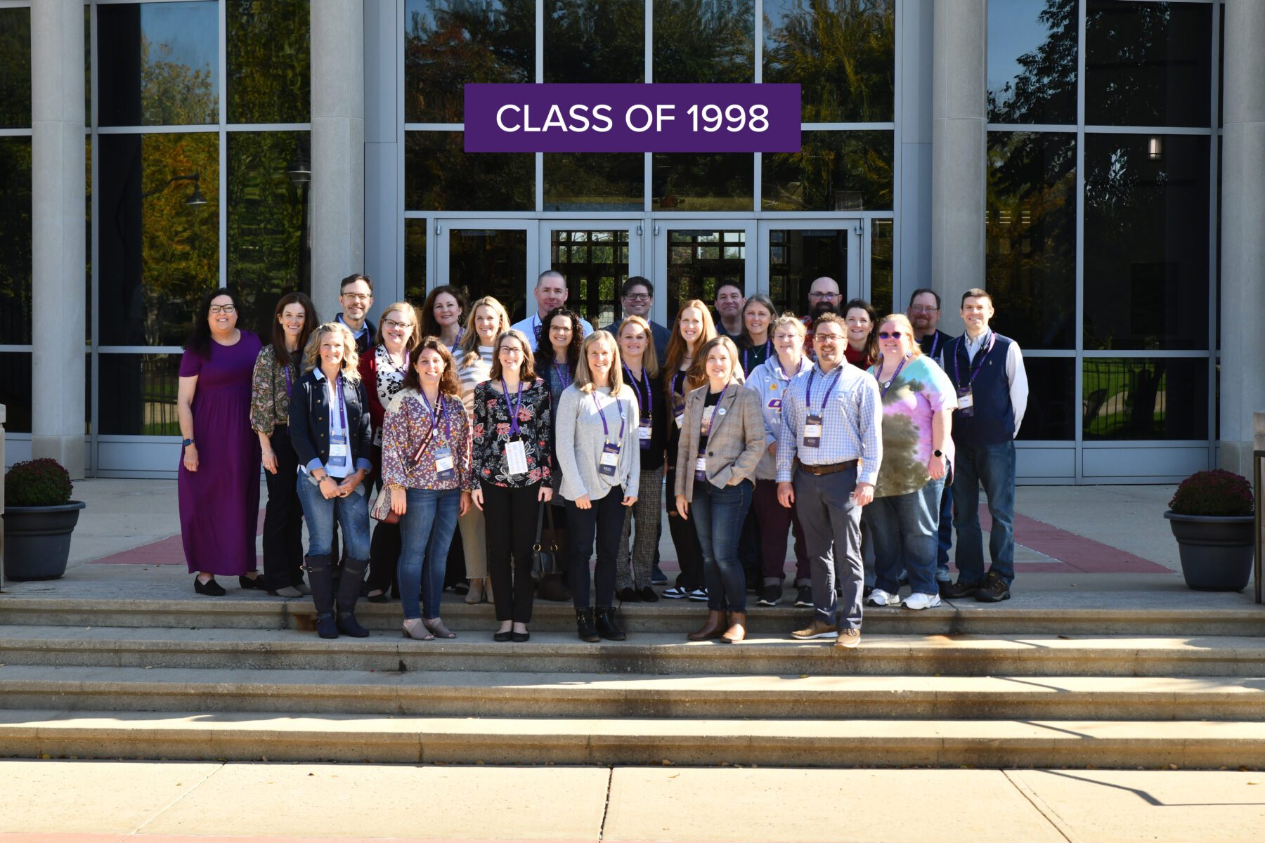 Those who came for the class reunion of 1998 pose for a group photo