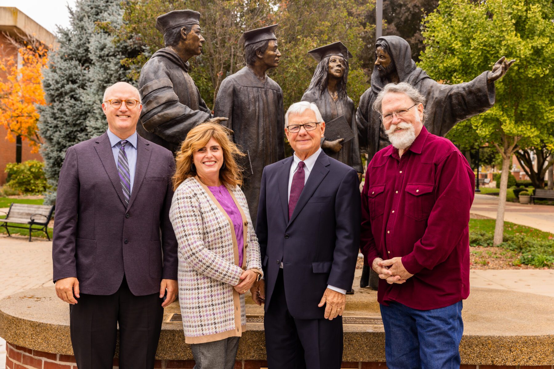 A group photo of President Gregg Chenoweth, Tammy Chenoweth, Ed Nash, and Scott Stearman
