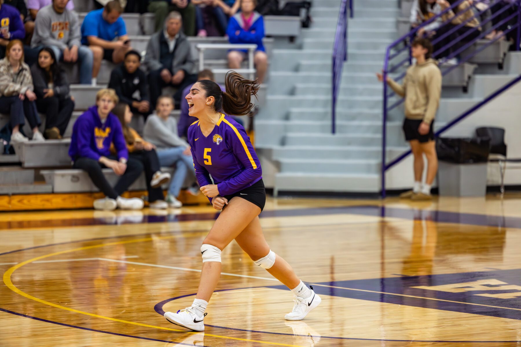 Sara Serafimova celebrates after a point in the volleyball game.