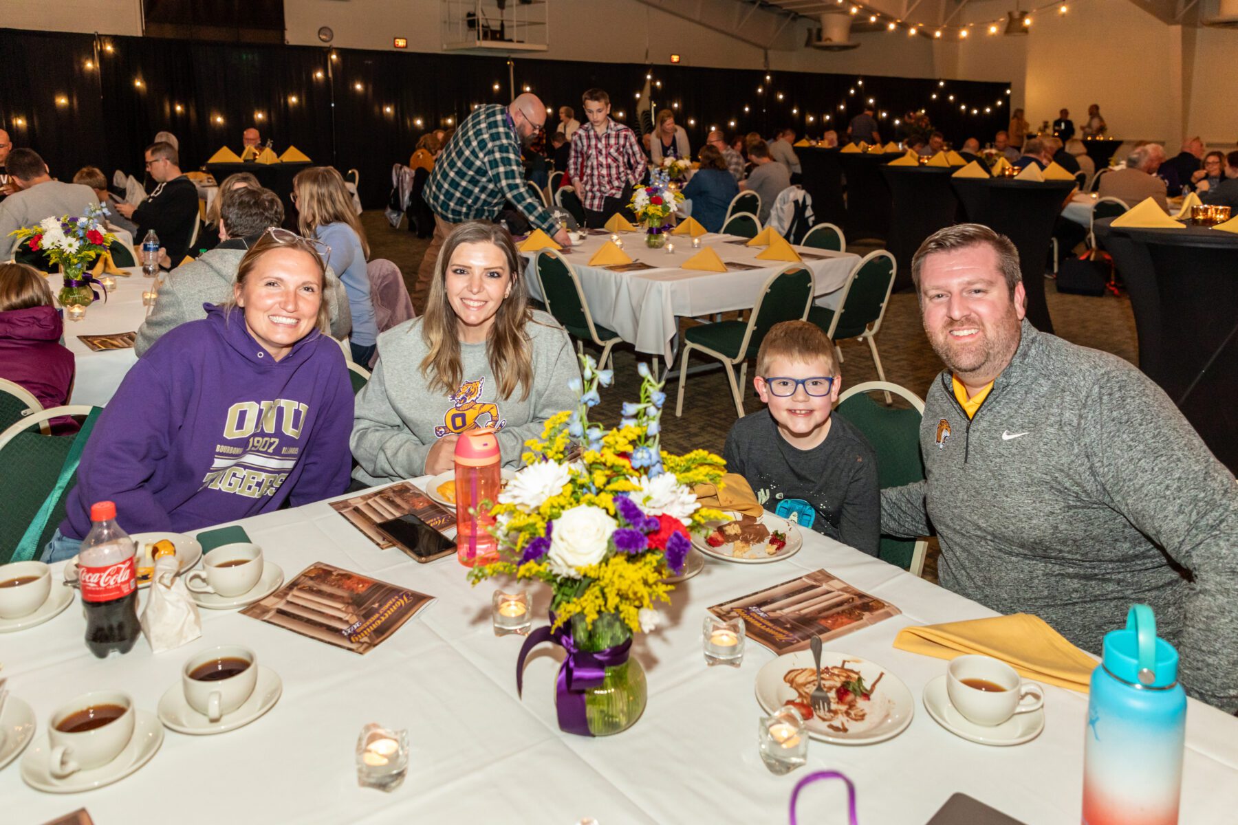 A photo of a group who are enjoying their time at the Taste of Olivet experience.