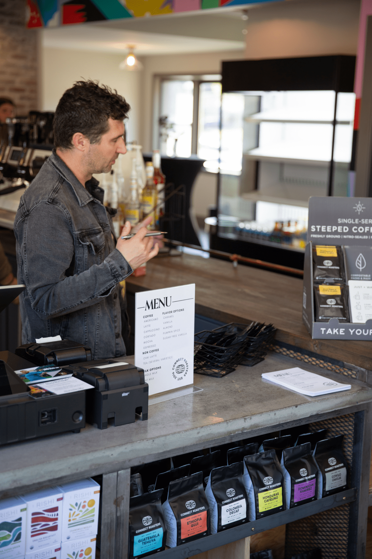 Caleb Benoit talking to the young alumni of Olivet