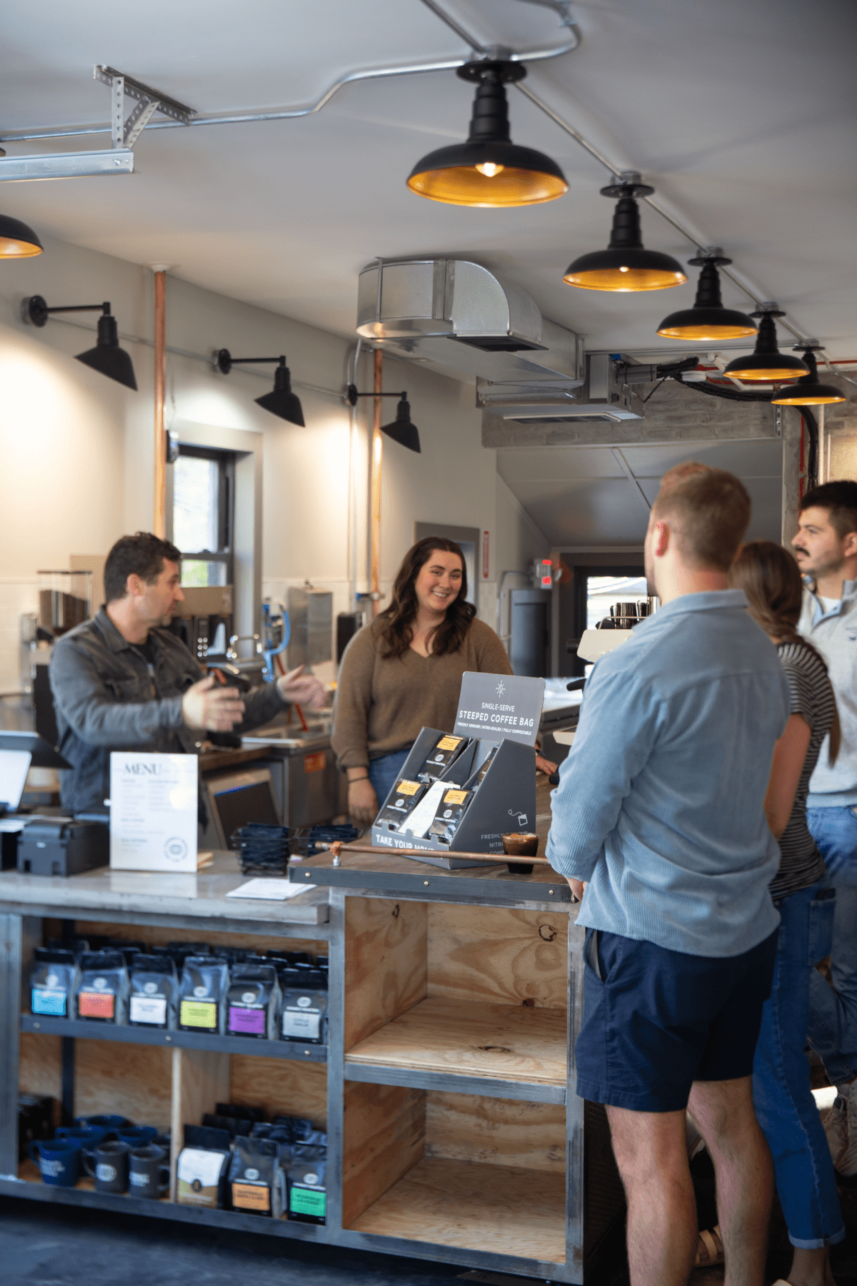 Young-alumni of Olivet wait for coffee at Connect Roasters