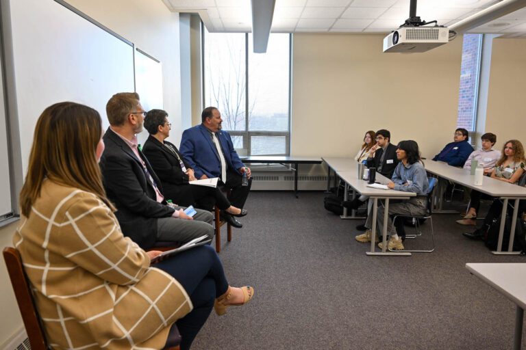 panel of state legislatures speaking to students