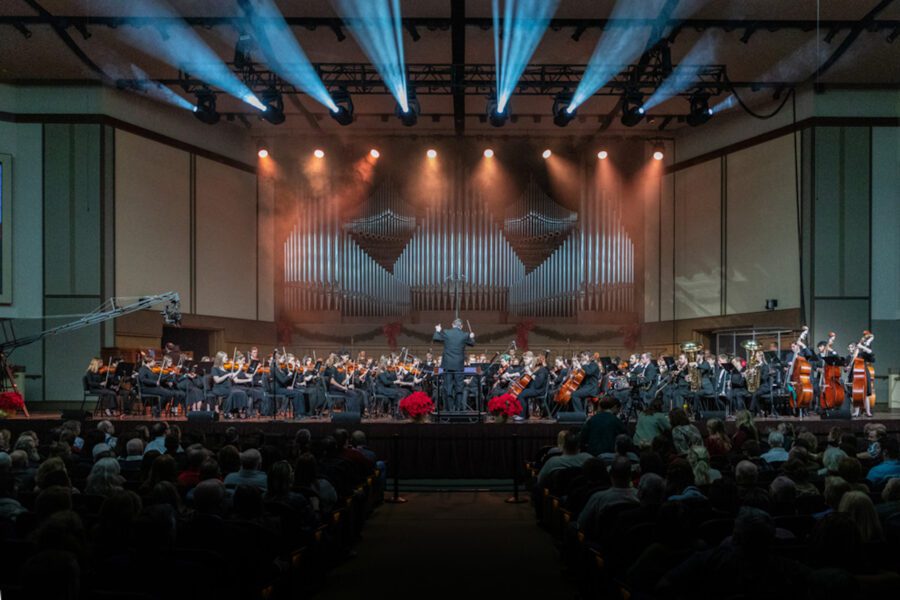 Students performing on stage in Centennial Chapel