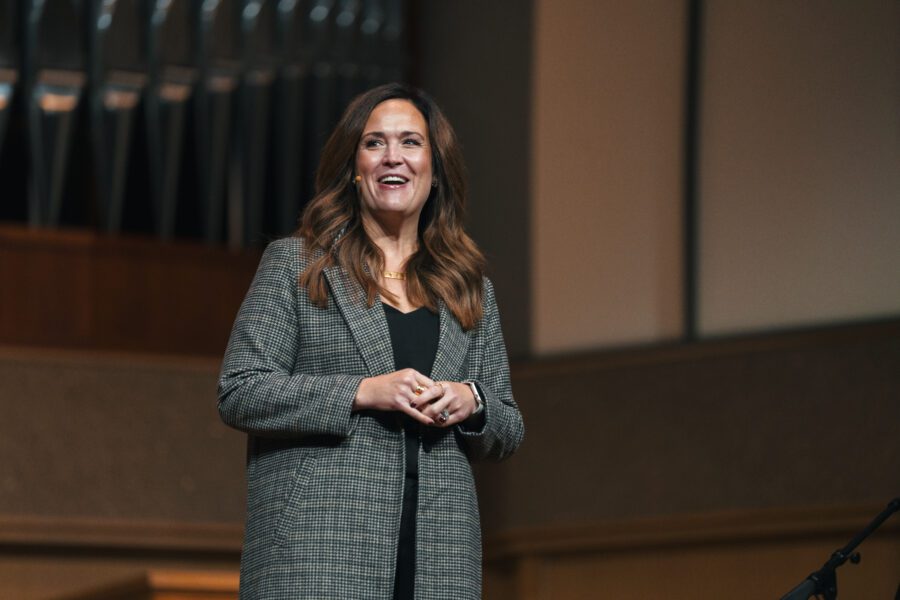 Photo of Alumna Tara Beth Leach speaking in Chapel at Olivet nazarene University