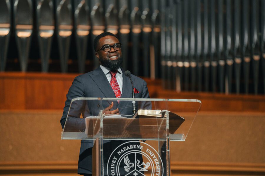 man speaking in chapel