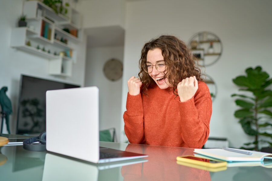 student gleeful at award package online