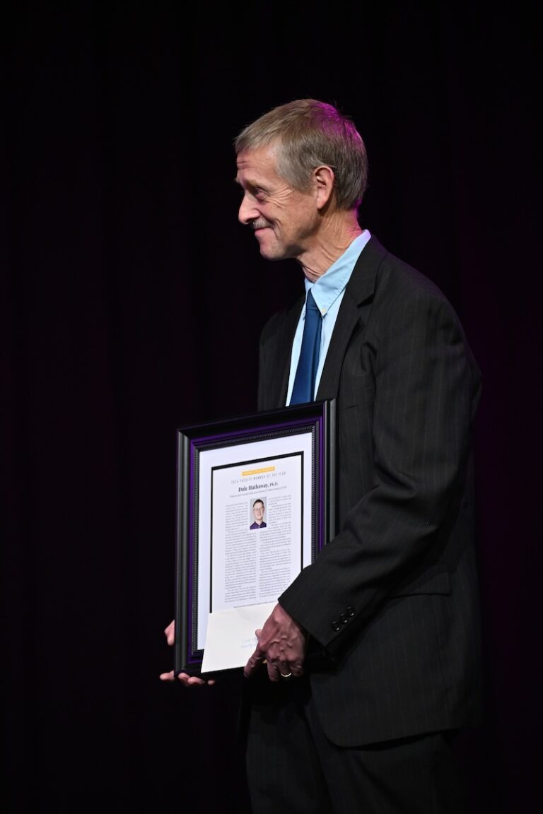 Dale Hathaway holding award