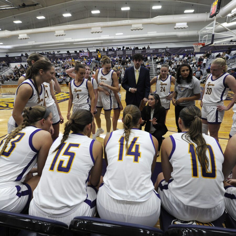 women's basketball team huddle