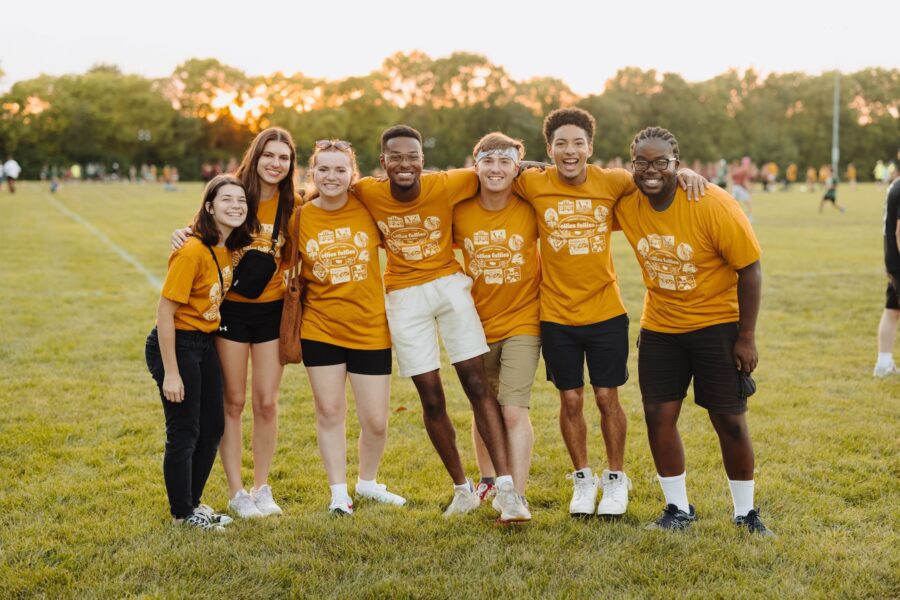 students smiling during athletic games