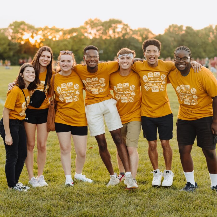 students smiling during athletic games
