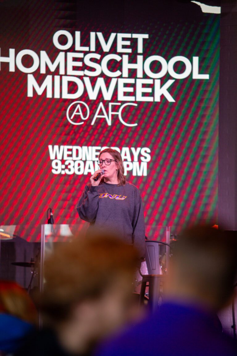 woman singing on stage