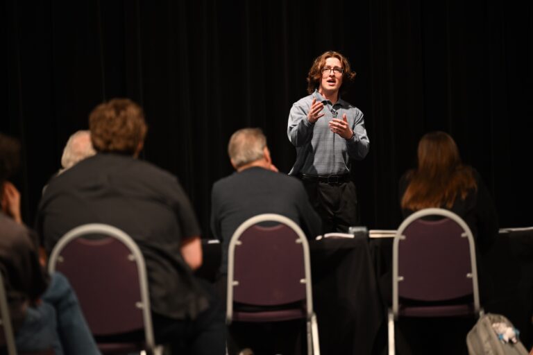student performing monologue on stage