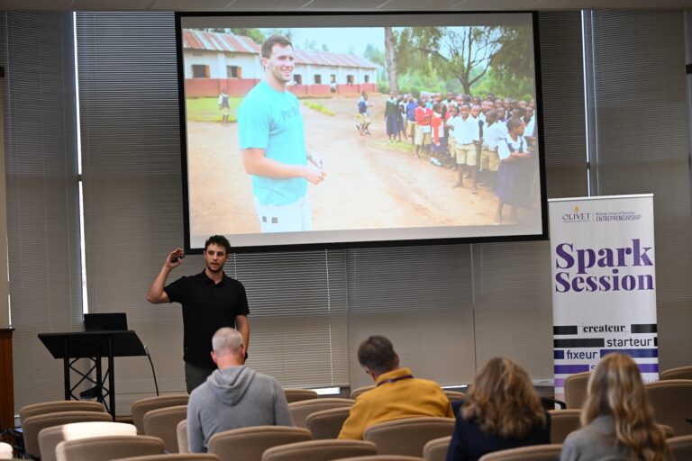 Man speaking at a breakout Spark session
