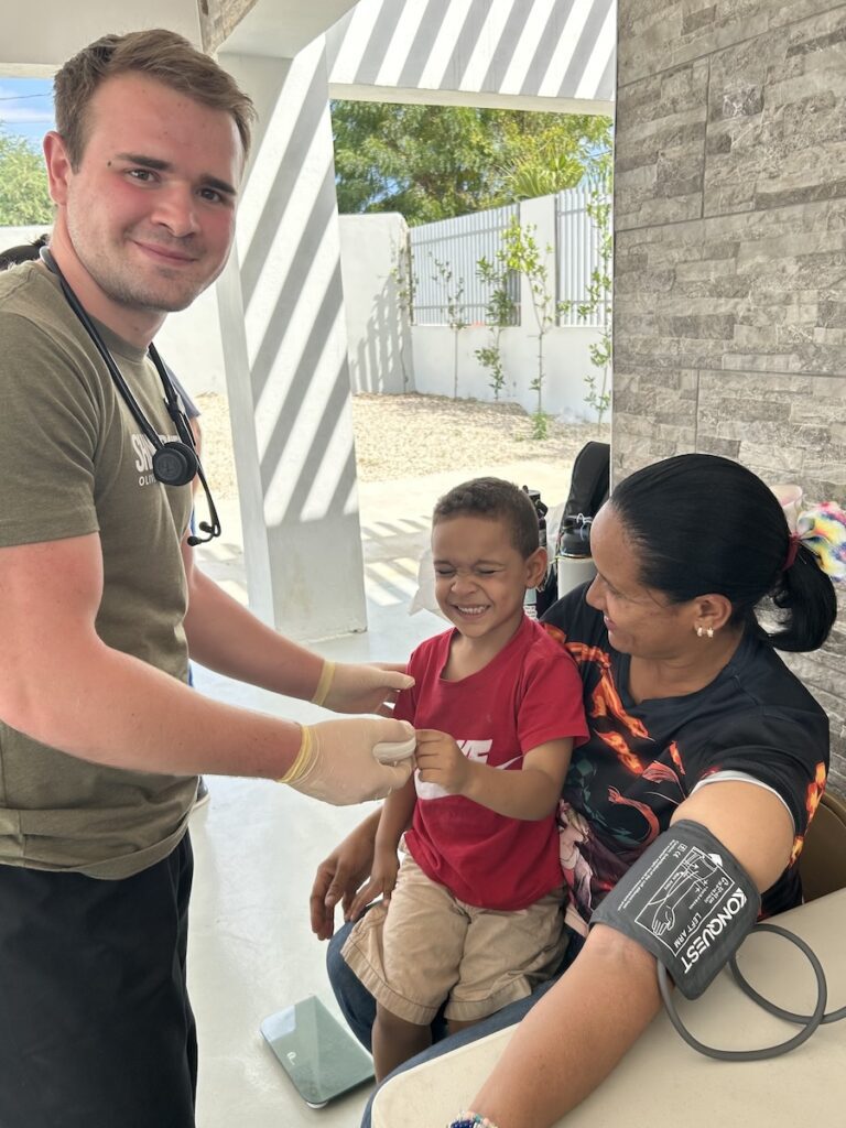 male student with patients