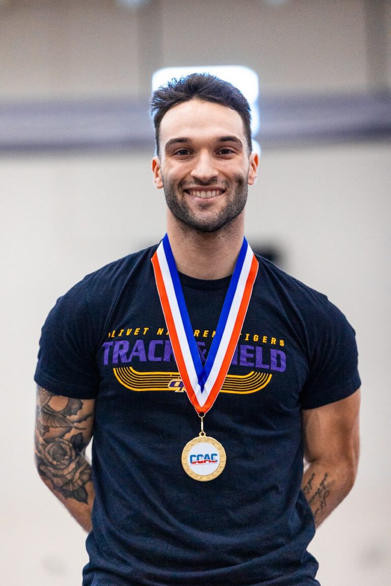Vincent Giuliano wearing a medal