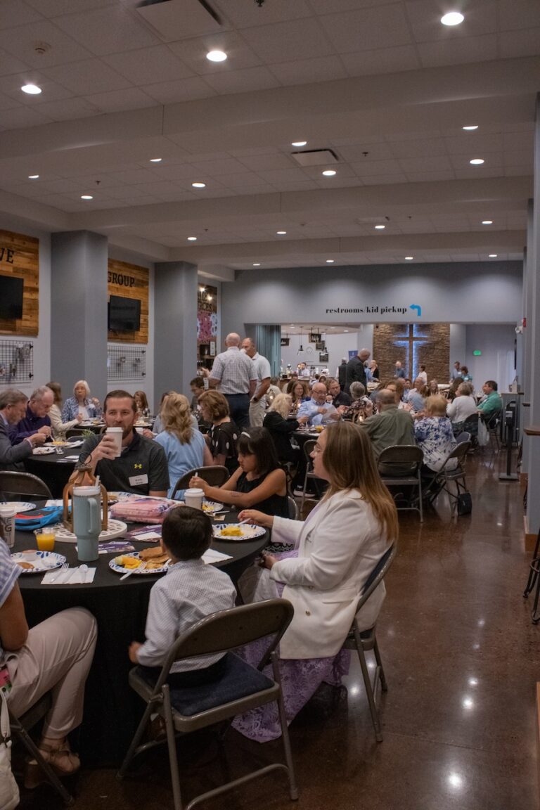 Alumni gathering at a church