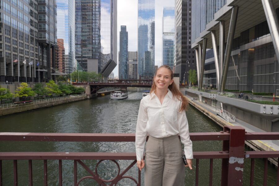 Mary Balashova posing on a bridge in Chicago