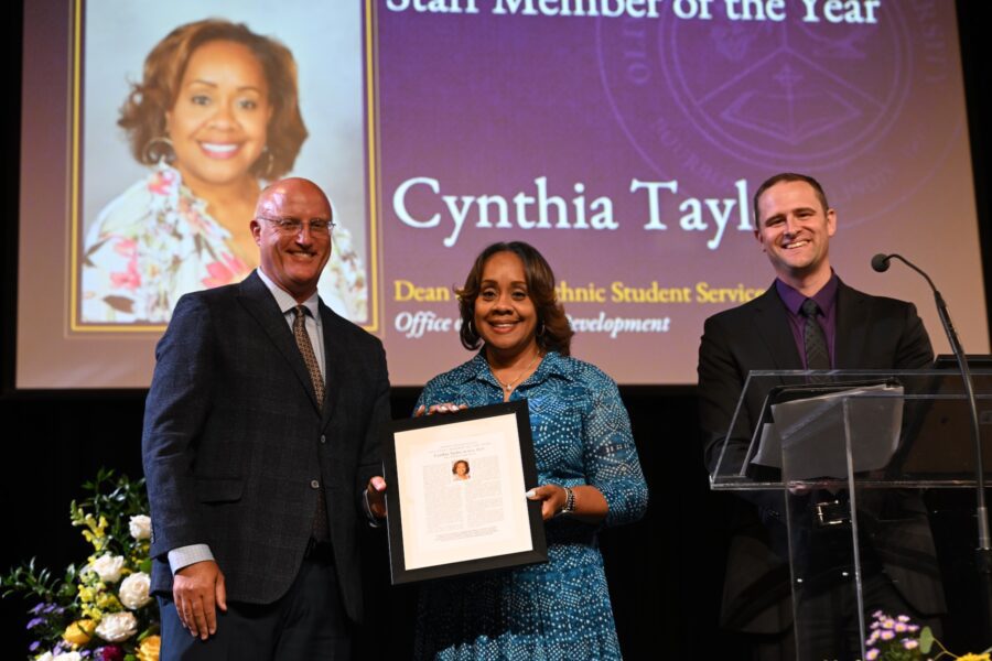Cynthia Taylor with an award