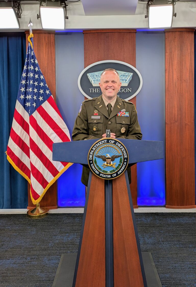 Kevin Sandell standing at podium